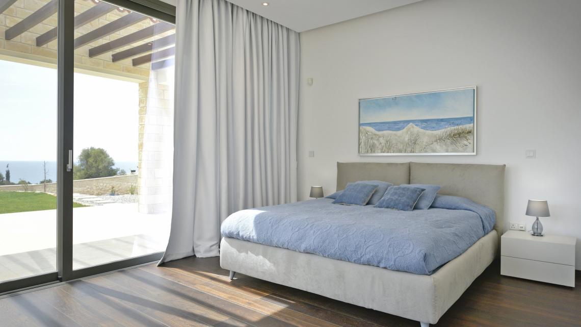 Modern Minimalist sleek simple warm inviting bedroom by Takis Angelides Furnihome Cyprus