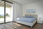 Modern Minimalist sleek simple warm inviting bedroom by Takis Angelides Furnihome Cyprus